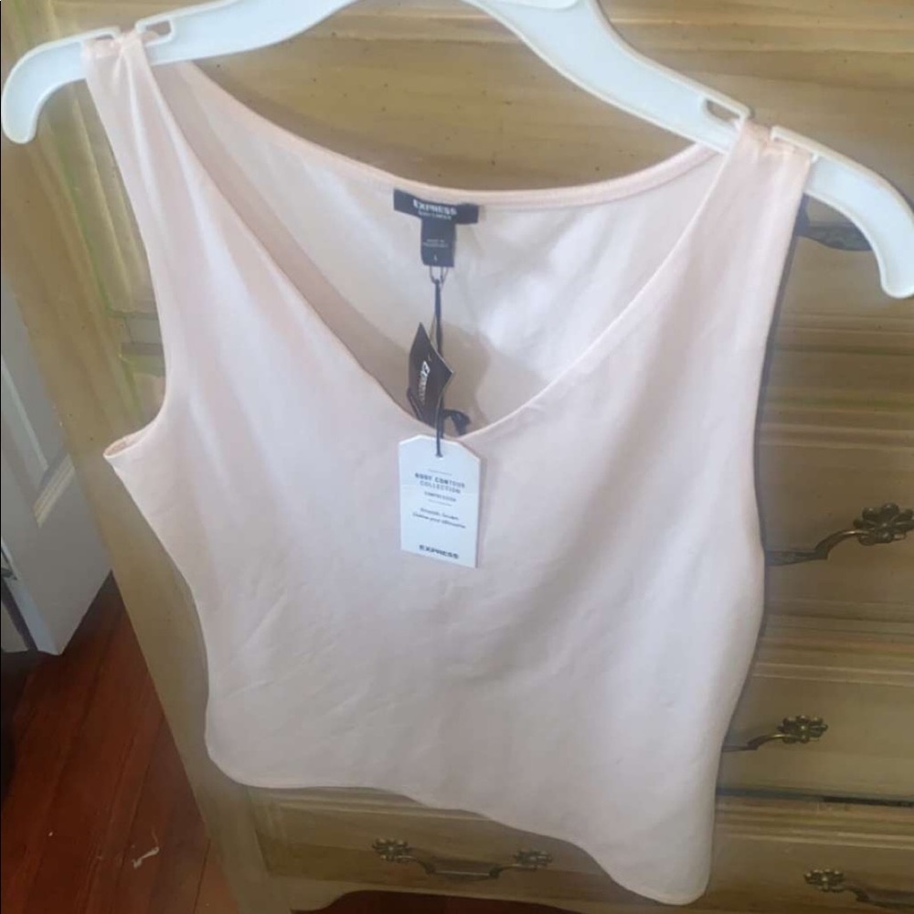 Cute blush tank top. Never worn.